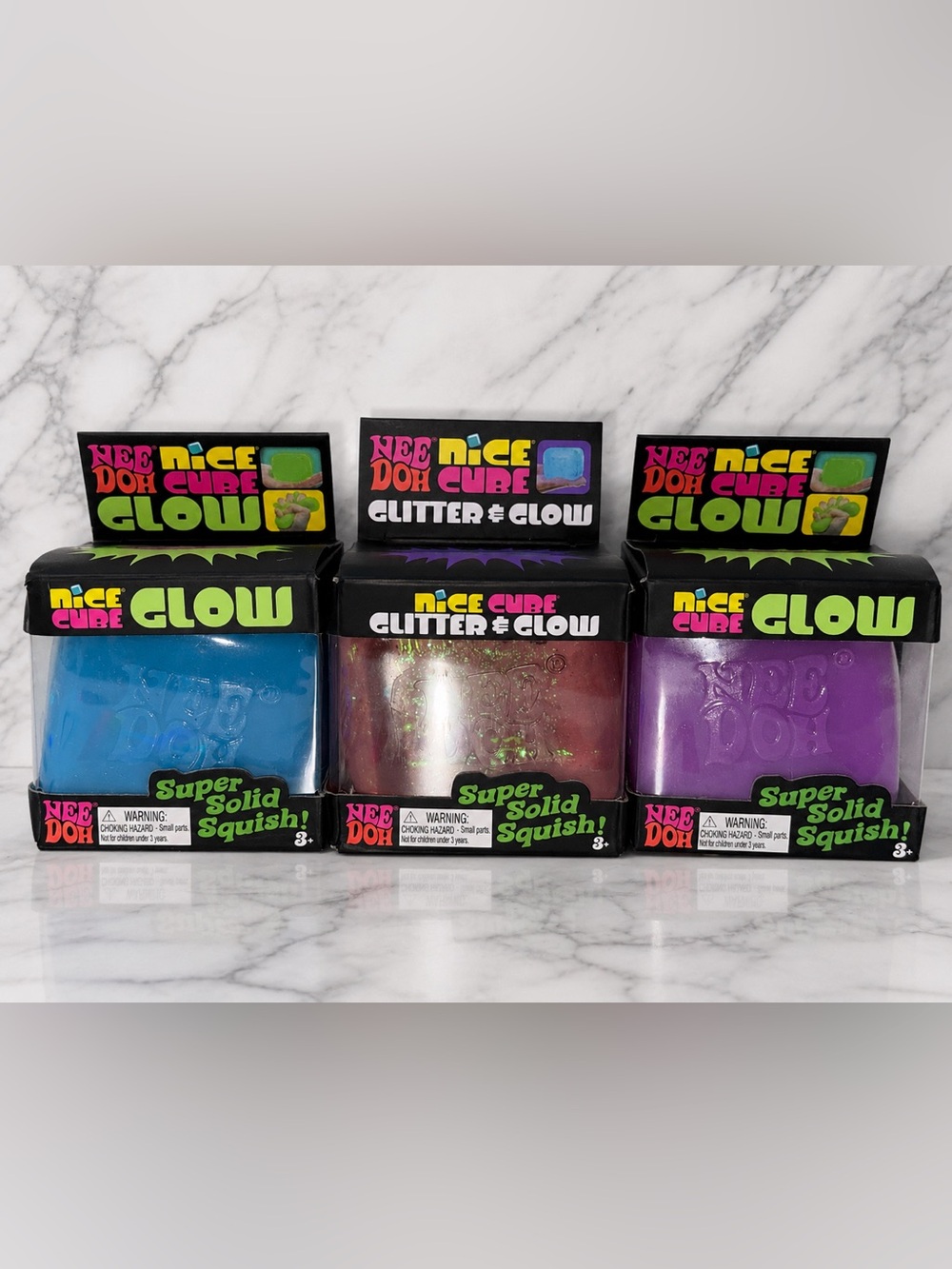 Nice Cube Glow Nee Doh Super Solid Squish - Blue, Purple, Pink